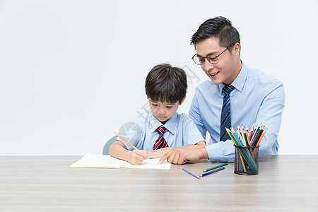 老师教学生画画学习教育高清图片素材