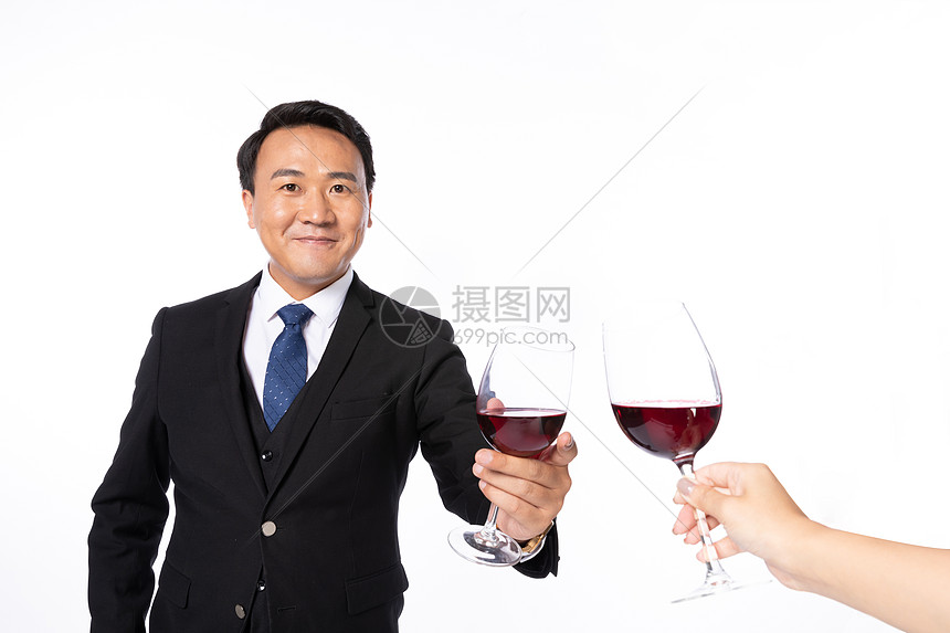 商务男师碰红酒杯图片