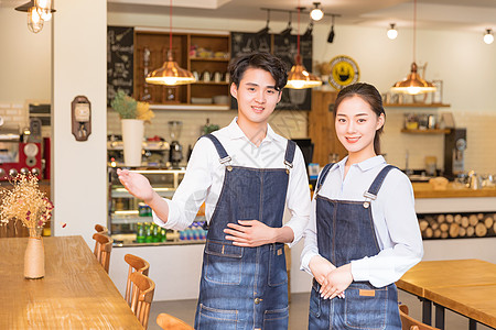 阳光服务咖啡馆男女服务员欢迎动作背景