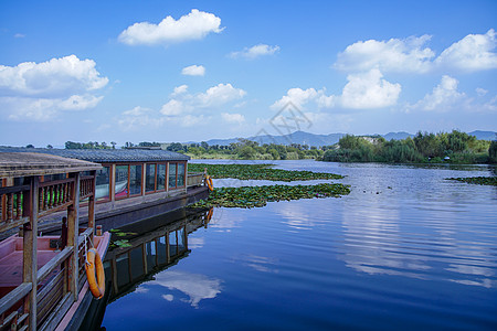 绿色生态家居生活普者黑游船湿地公园背景