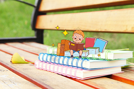野餐卡通看书的小朋友设计图片