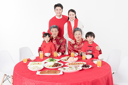 新年剪纸新年家庭年夜饭背景