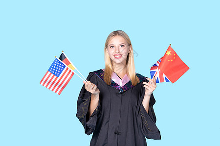 留学生手拿国旗图片