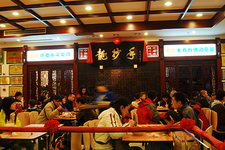 餐饮店LOGO成都春熙路上龙抄手饮食店背景