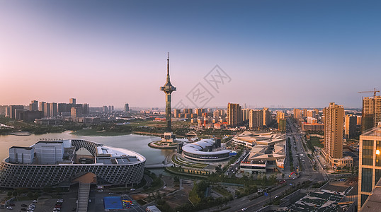 夕照聚龙湖城市背景高清图片素材