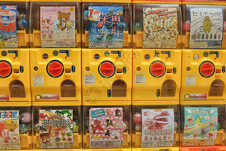 香港街头糖果色的扭蛋机背景图片