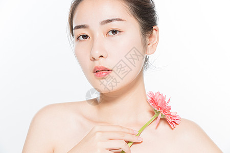 美妆模特美妆女性与花背景