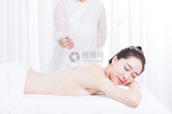 女性养生SPA海沙按摩 图片