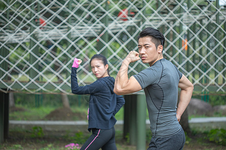 团队拓展健身团队展示肌肉形象背景