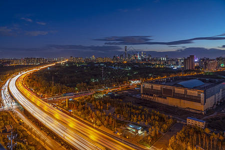 北京夜景车流轨迹背景图片