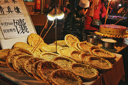 小吃富贵饼美食西安回民街特色馕饼摊背景