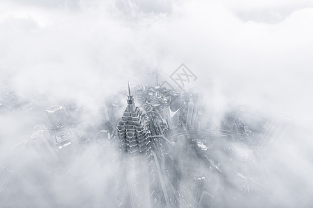 云雾中的上海外滩背景图片