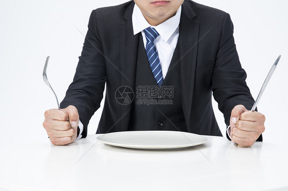 等待上菜的商务男士愤怒图片