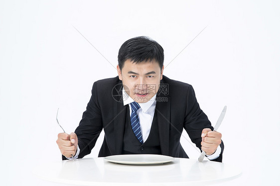 等待上菜的商务男士愤怒图片