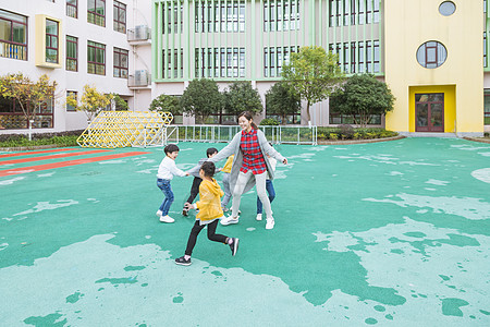 儿童游乐园幼儿园老师和孩子玩游戏背景