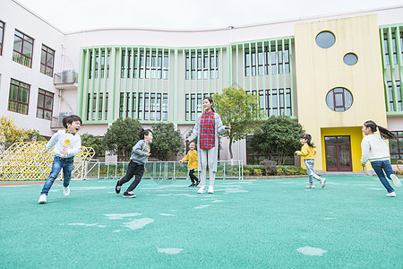 儿童游乐园幼儿园老师和孩子玩游戏背景