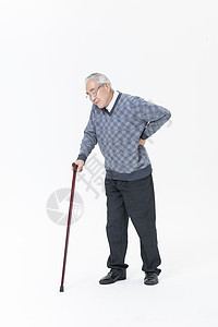 称着拐杖的老人背景图片