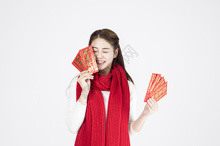 新年女性手拿红包高清图片