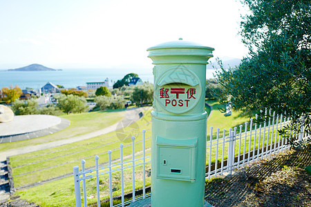 日本小豆岛橄榄公园绿色邮箱邮筒背景