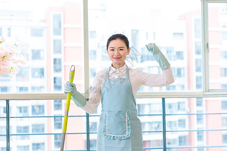 家政服务女性家政保洁努力形象背景