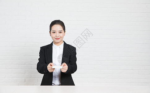 和风商务名片商务女性前台递名片背景