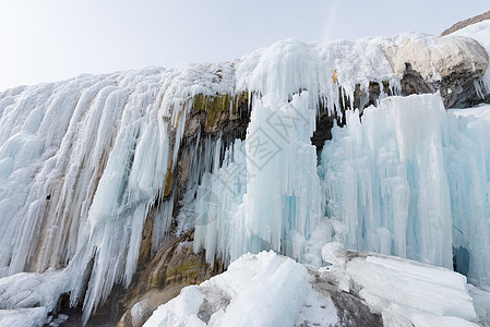 卡定沟瀑布青海岗什卡雪峰背景