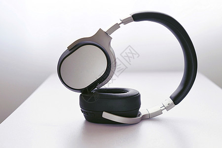 无线蓝牙耳机简约运动蓝牙耳机电子数码产品背景