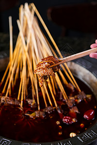 麻辣鸡肉火锅串串背景图片