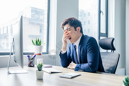 商务男士办公室犯困图片