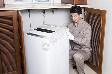 工人家电维修洗衣机男性高清图片素材