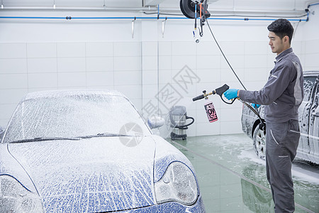 汽车清洗工人洗车背景图片