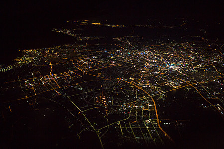 上海城市上空夜景飞机视角背景图片