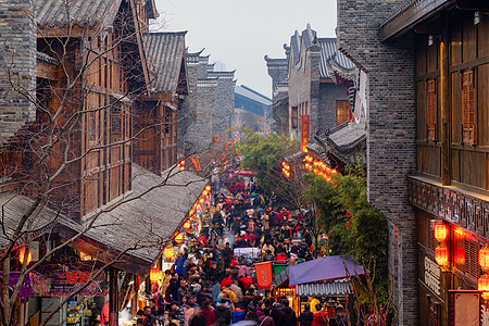 旅游人群新年春节庙会上熙熙攘攘的人群背景