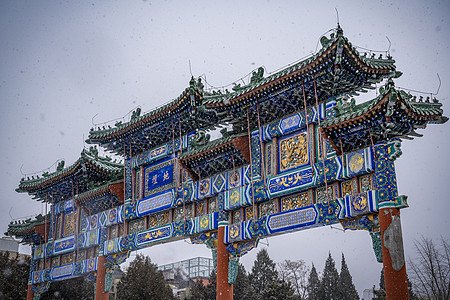 地坛古建筑雪飘地坛牌坊背景