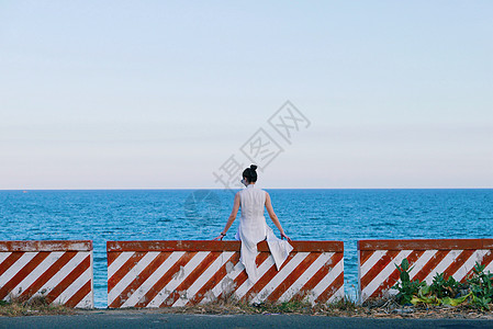 越南女人海边少女背影背景