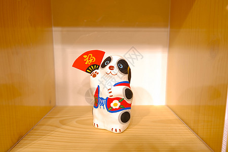 日本娃娃日本传统乡土娃娃狗狗背景