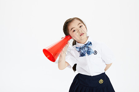 小学生拿着听筒背景图片