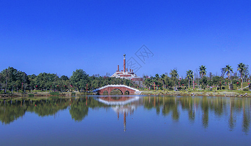 彝族建筑春天湿地公园景色背景