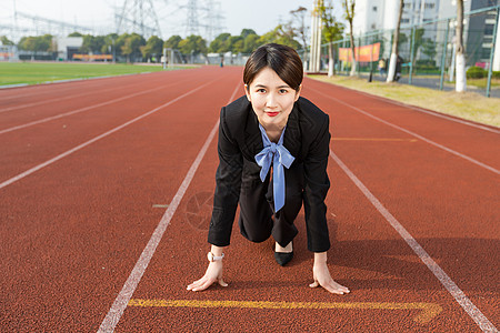 成功女性商务人士起跑准备背景