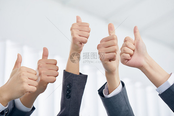 商务团队举大拇指图片
