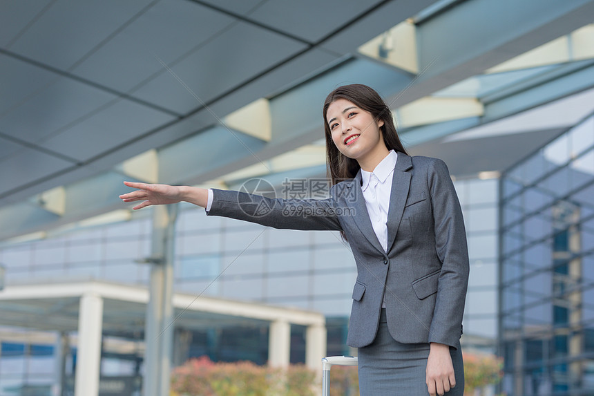 商务女性机场打车图片