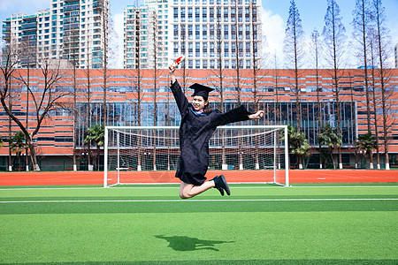 学士服跳跃学生应届毕业生操场跳跃背景