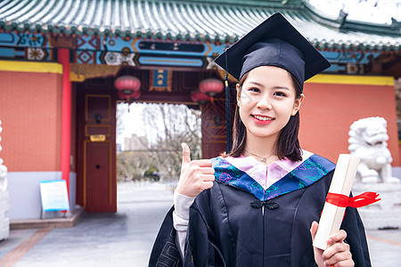 学校女大学生拿毕业证点赞背景