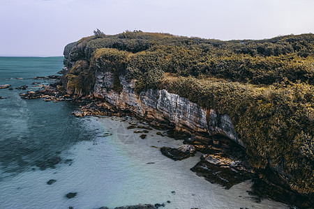 海水江崖涠洲岛暮崖背景