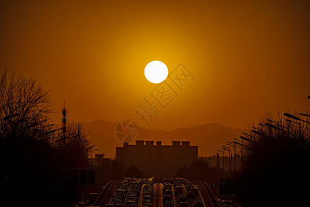 日落北京安定门西大街桥高清图片