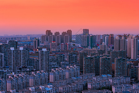 别墅夜景日落下密集的城市建筑背景