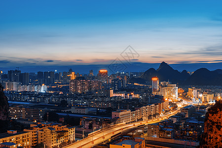 夕阳车桂林临桂区老城区俯瞰城市风景背景