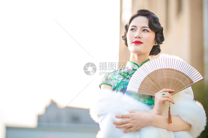 旗袍女性折扇图片