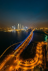 苏州中心和观景大桥以及金鸡湖夜景背景图片