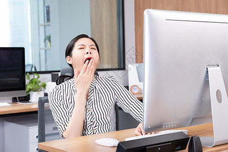 犯困商务女性商务女性打哈欠背景